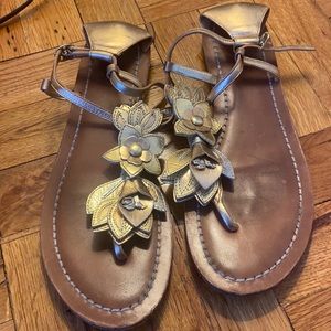 Coach golden and bronze leather thong sandal.